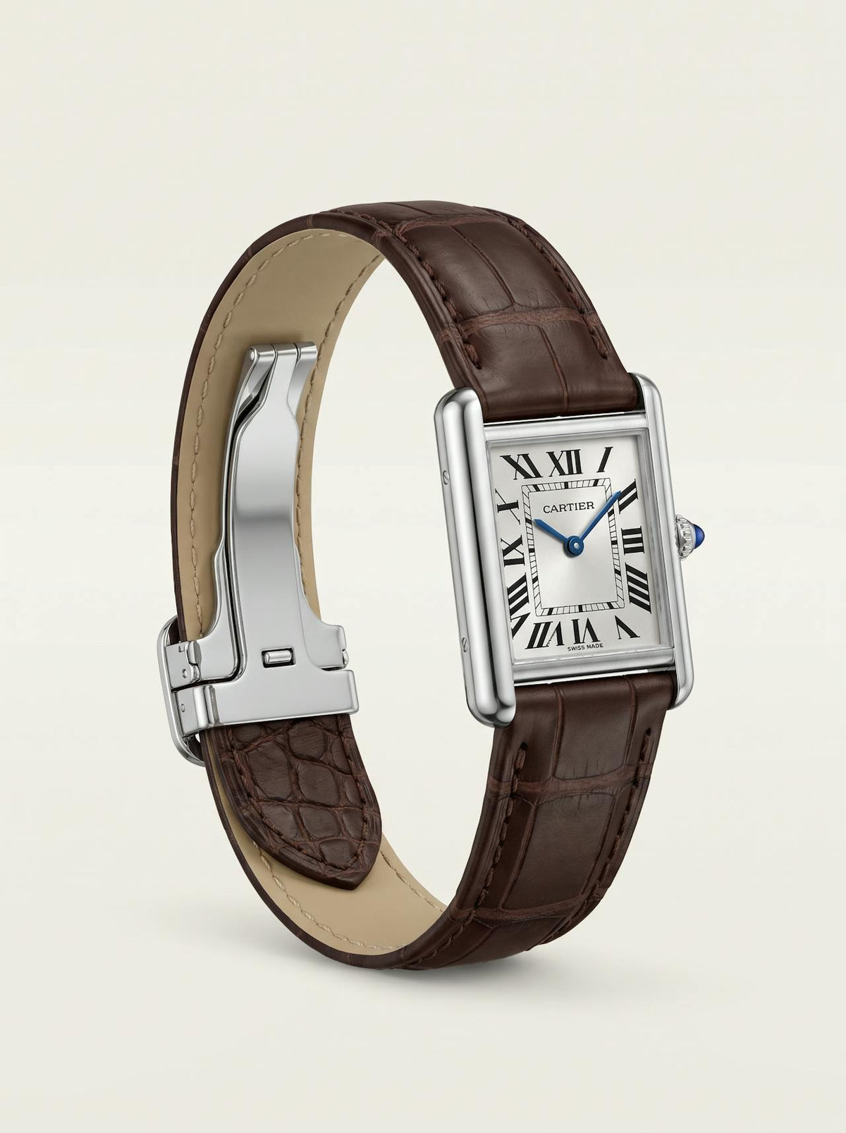 Brown square alligator-grain leather Cartier Tank strap, 16mm, angled view showing beige lining and folding deployant clasp