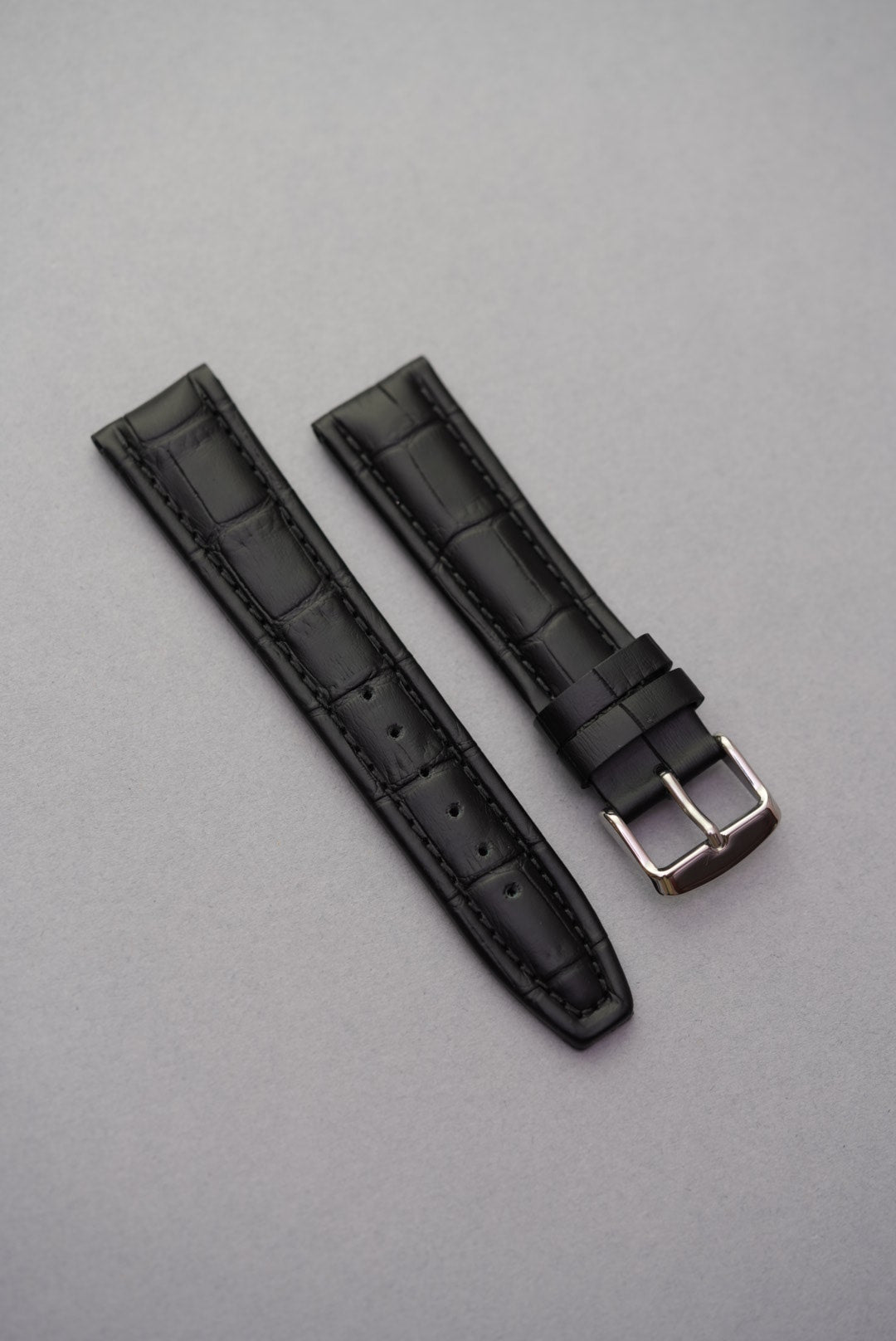 Premium black leather strap with alligator embossing, designed to fit Swatch x OMEGA MoonSwatch Mission to the Moon watches.