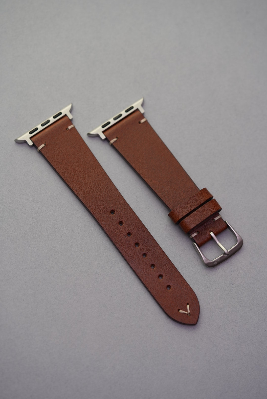 Brown calfskin lug-stitched strap on Apple Watch, full view