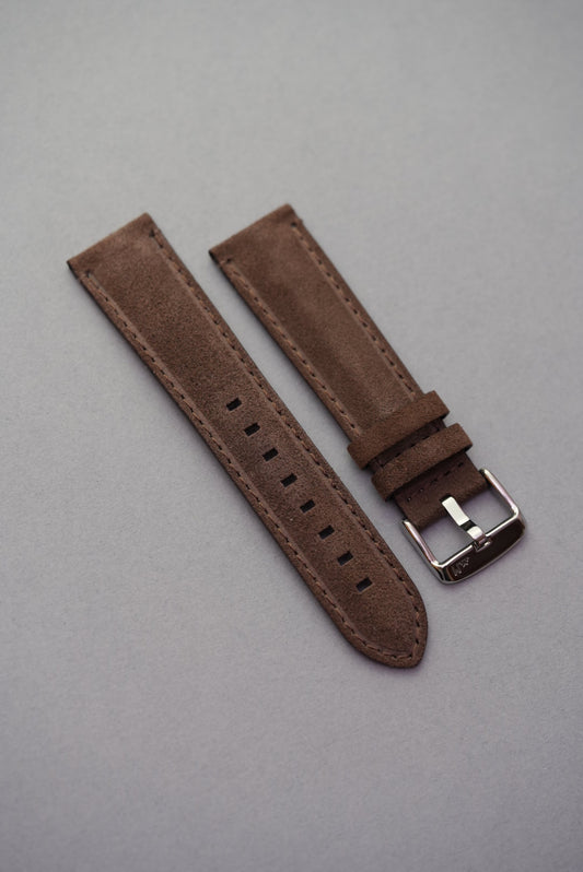Brown suede leather watch strap laid flat with stainless buckle – suitable for strap replacement