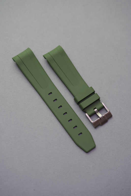 Army green MoonSwatch FKM rubber strap with curved ends and a tactical smooth finish for everyday performance.