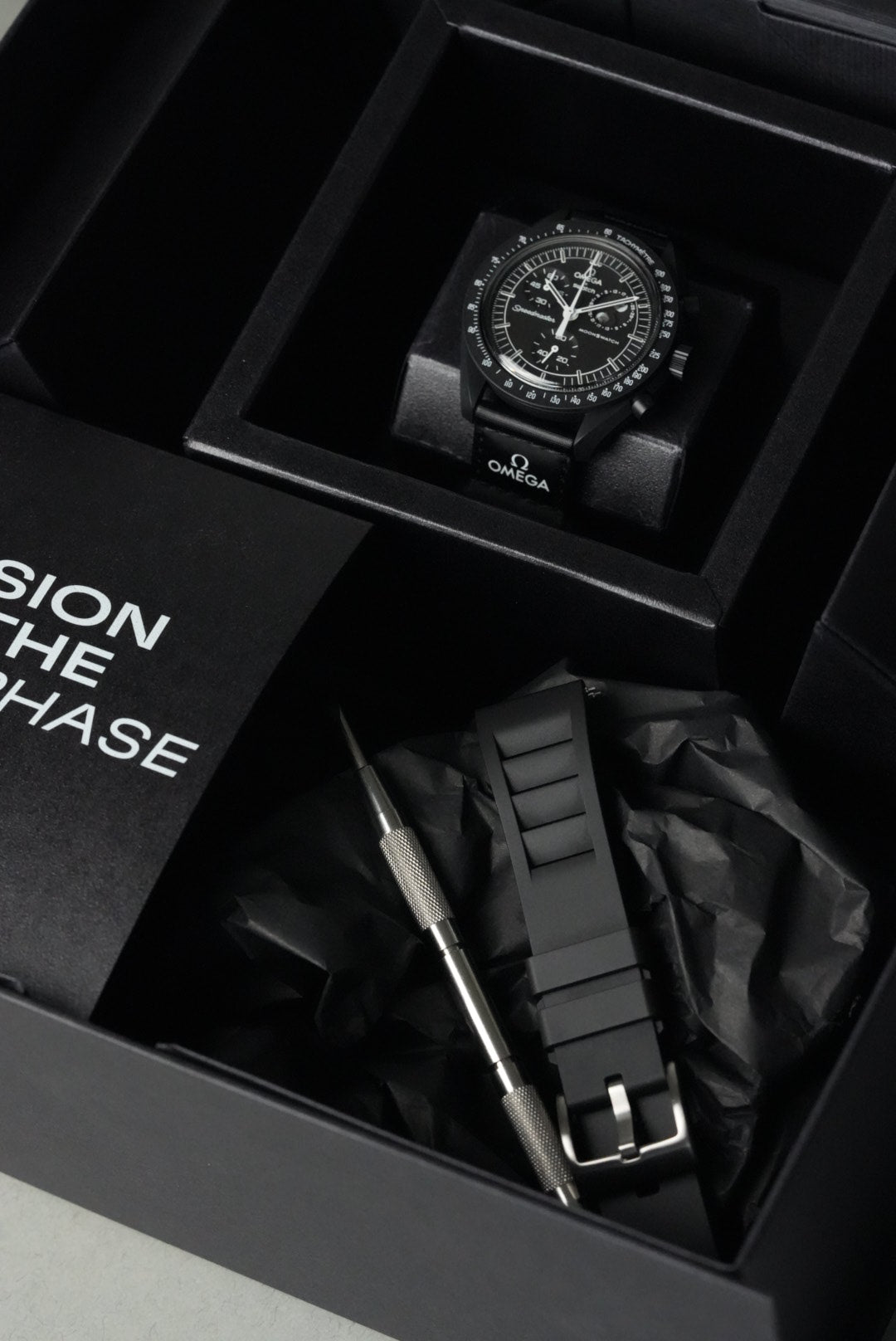 Watch in a black box with 'Mission: Impossible' branding