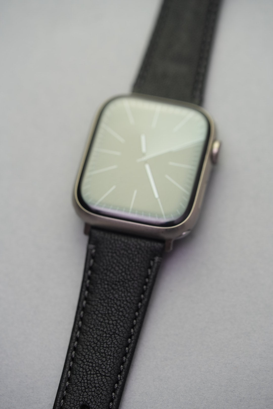 Detailed view of Piano Noir strap adapters for Apple Watch, crafted in stainless steel for a seamless fit.