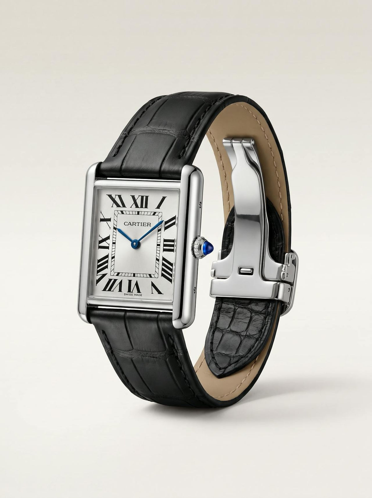 Black square alligator-grain leather Cartier Tank strap, 16mm, angled view showing beige lining and folding deployant clasp