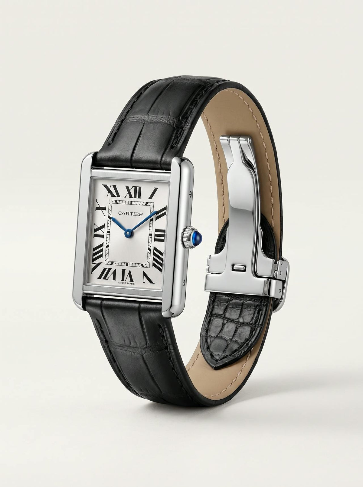 Black square alligator-grain leather Cartier Tank strap, 17.5mm, angled view showing beige lining and folding deployant clasp