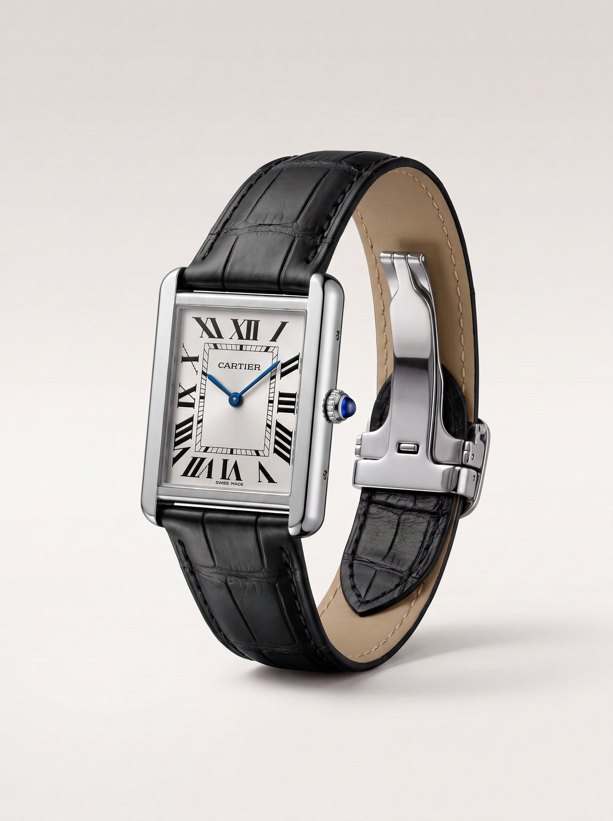 Black square alligator-grain leather Cartier Tank strap, 20mm, angled view showing beige lining and folding clasp