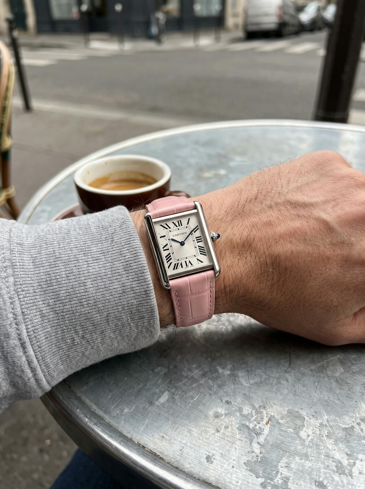 Cartier Tank Must Extra-Large on a pink square alligator-grain leather strap, worn on the wrist