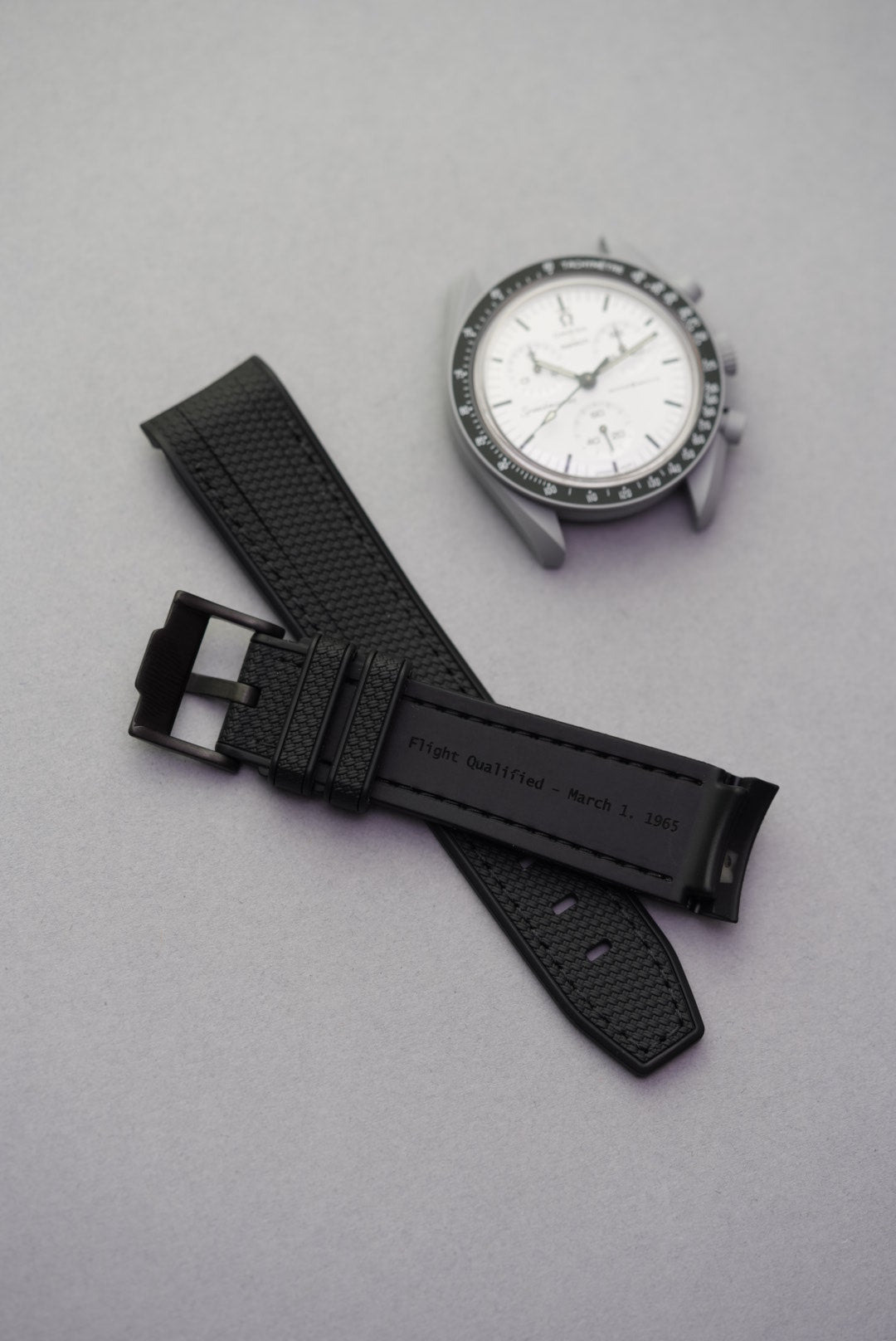 MoonSwatch 1965 Engraved Rubber Woven Strap — "Flight Qualified"