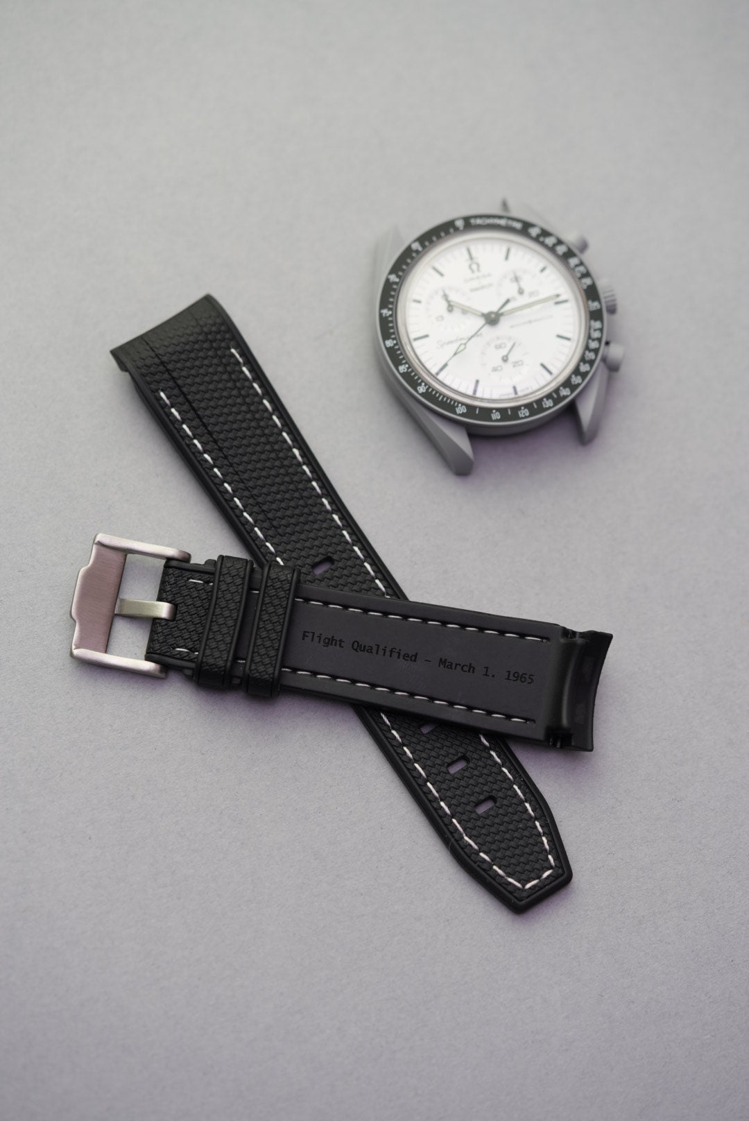 MoonSwatch 1965 Engraved Rubber Woven Strap — "Flight Qualified"