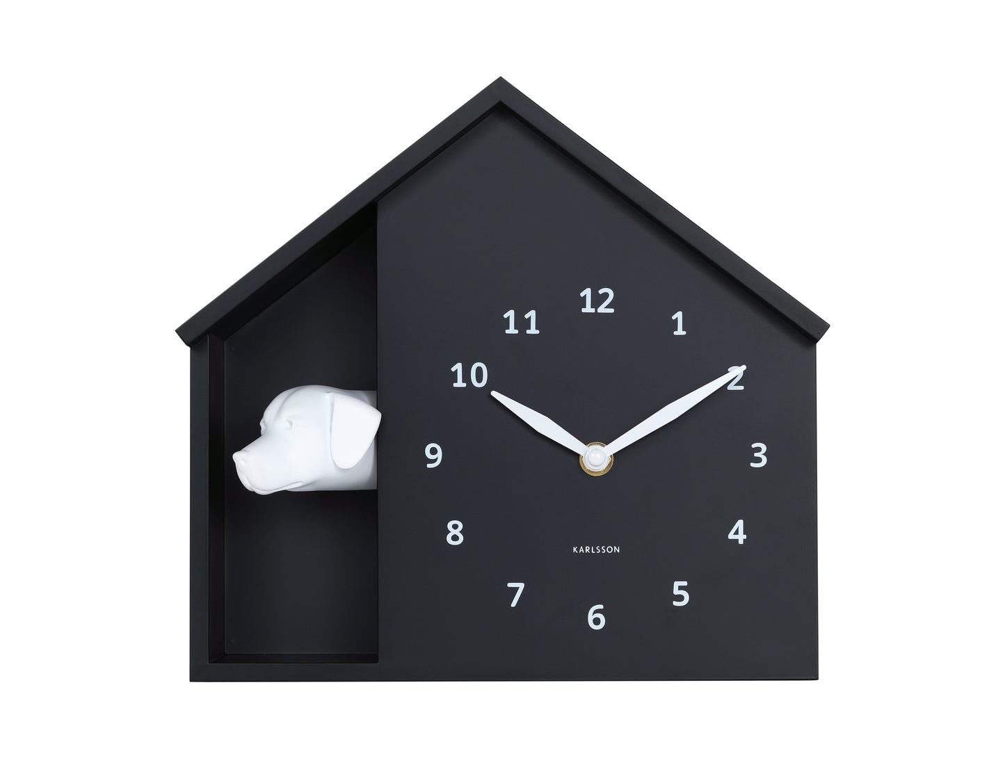 Black house-shaped clock with white rabbit inside on a white background