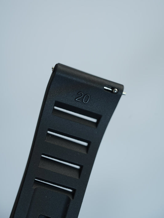 Detailed view of the black FKM rubber strap’s vented design and engraved 20mm size marking, ensuring a secure and perfect fit