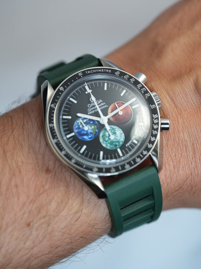 Premium green FKM rubber watch strap paired with an Omega Speedmaster, highlighting a sporty and elegant look for collectors.