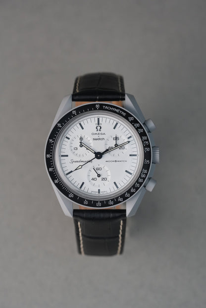 1965 moonswatch fitted with a black leather strap