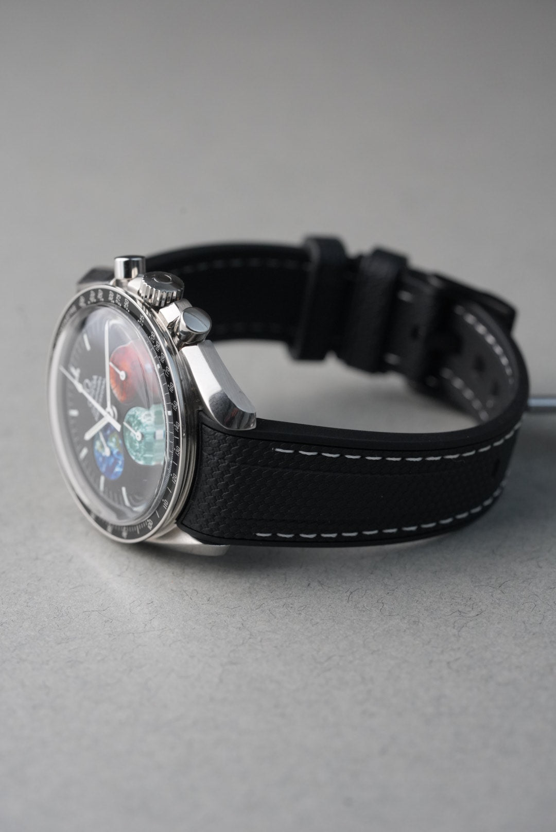 Smartwatch with a black strap on a gray background