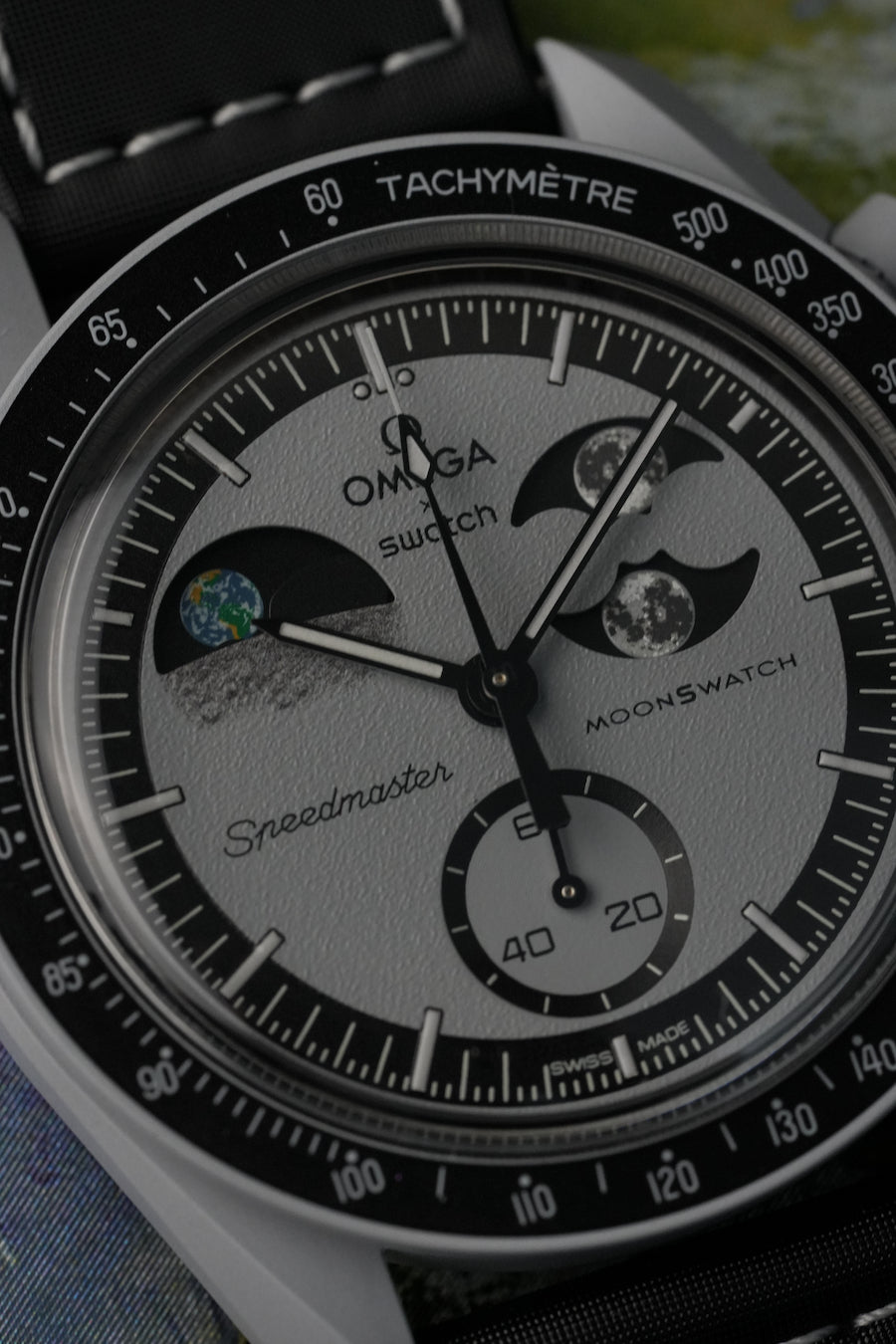 Omega Speedmaster MoonSwatch watch face with moon phase display