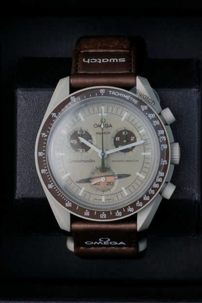 MoonSwatch Mission to Saturn with factory screen protector — new and unworn condition