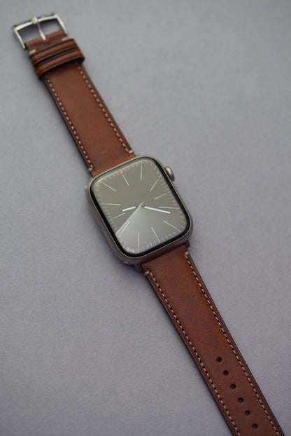 Full view of Apple Watch with brown fine grain leather strap – compatible with all Apple Watch models