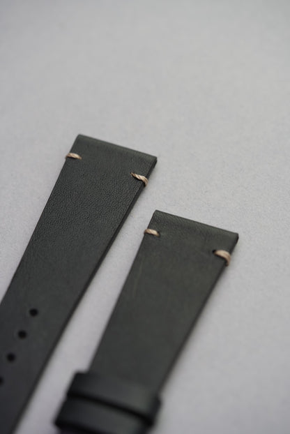  Side view of upgraded black calf leather strap fitted to Apple Watch with stitched lugs.
