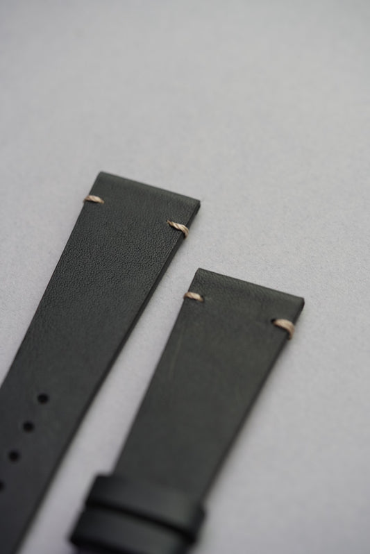  Side view of upgraded black calf leather strap fitted to Apple Watch with stitched lugs.