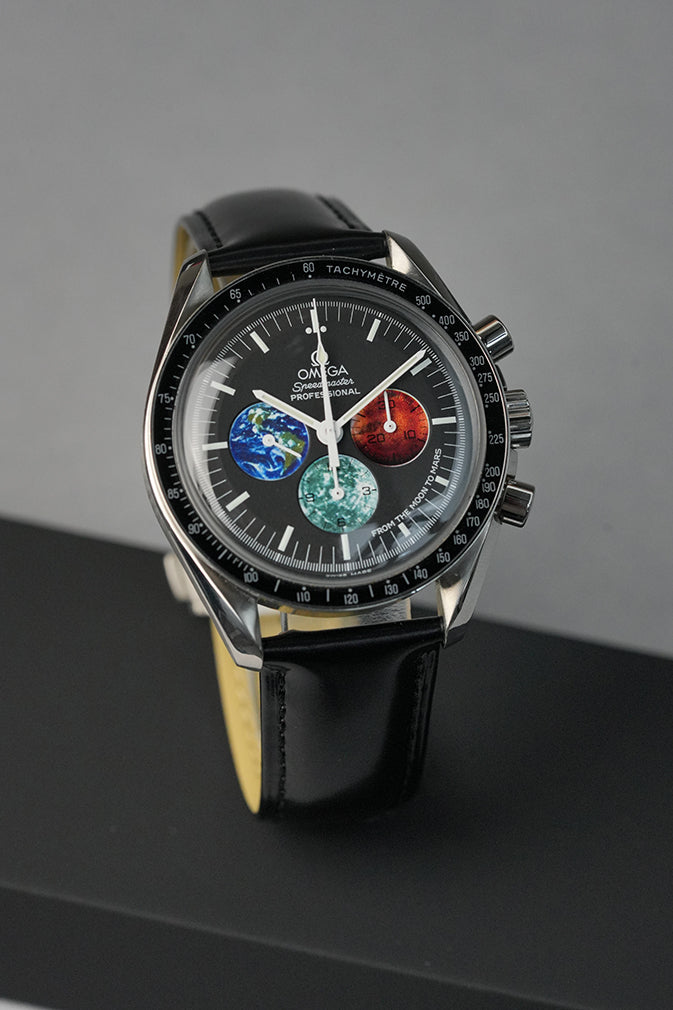 Black smooth leather deployant clasp watch strap on a omega speedmaster watch