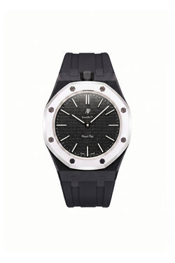 A Royal Oak watch by Audemarsieu with a black dial, black textured bezel, and a black silicone strap, set against a plain white background.