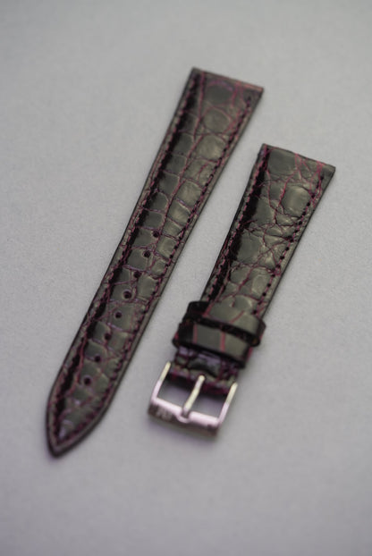 Full view of the Bordeaux crocodile leather strap for Cartier, with wine-toned stitching and high-gloss finish.