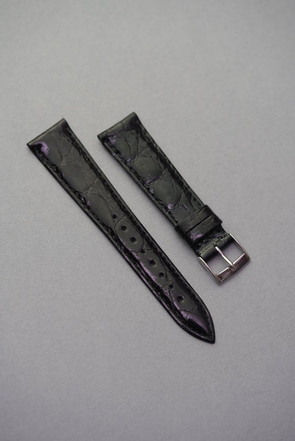  Noir black crocodile leather watch strap for Cartier, featuring subtle purple undertones and a sleek, polished grain.