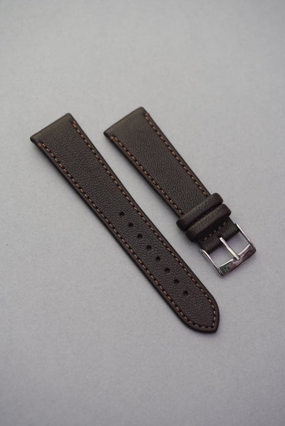 Cortado Chestnut sheepskin watch strap in rich coffee brown with soft contrast stitching and polished finish.