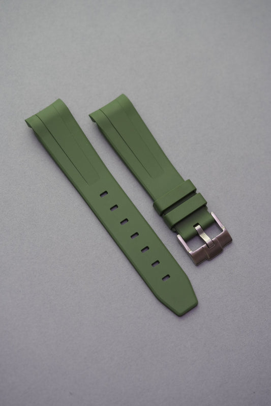 Army green MoonSwatch FKM rubber strap with curved ends and a tactical smooth finish for everyday performance.