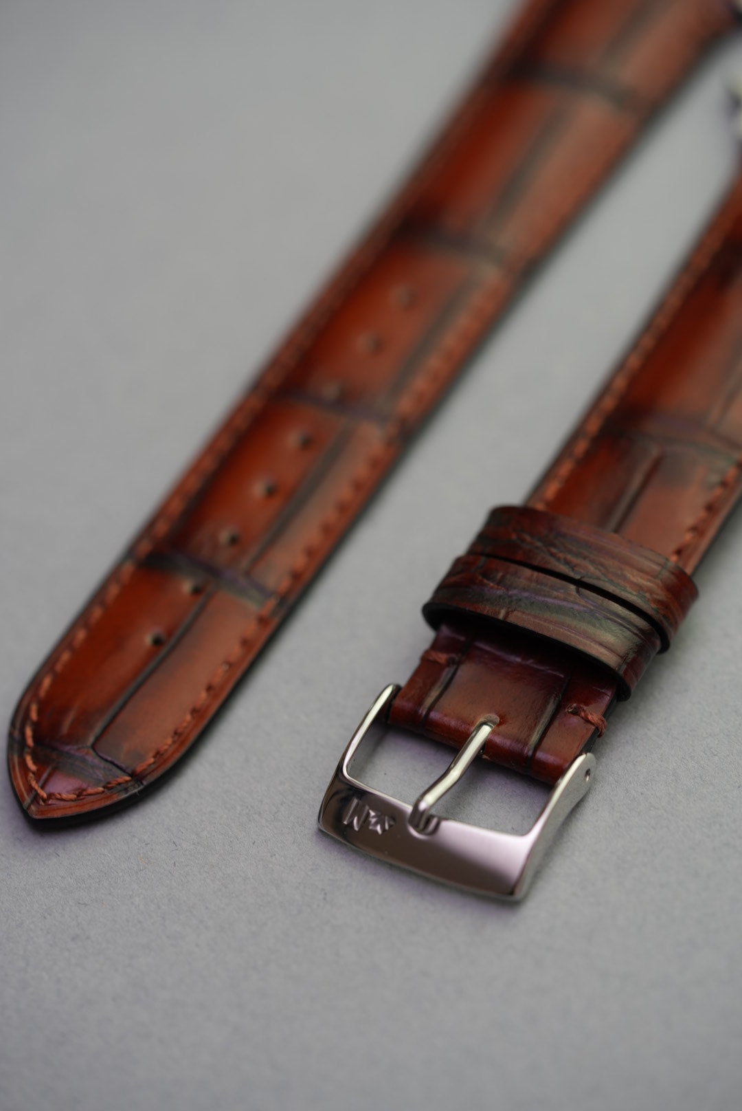 Light brown alligator grain leather strap for Apple Watch with polished steel buckle