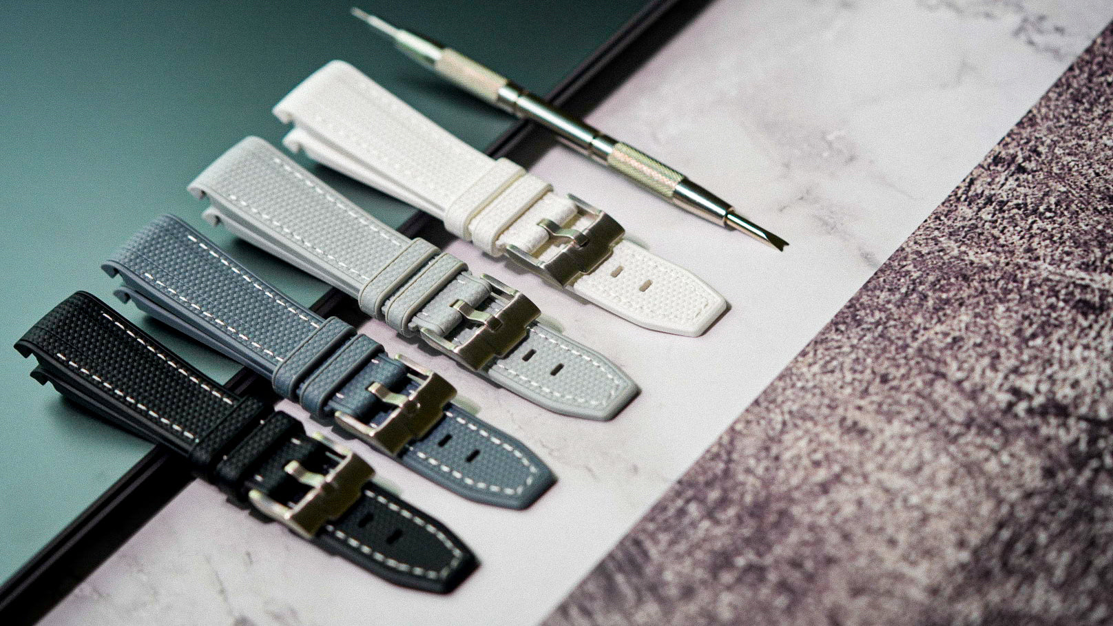 Premium rubber watch straps for Omega MoonSwatch, featuring textured designs in black, dark grey, light grey, and white. High-quality stainless steel buckles with contrast stitching for a luxury look. Compatible with Swatch x Omega MoonSwatch models. Available at MGBWATCHES.COM.