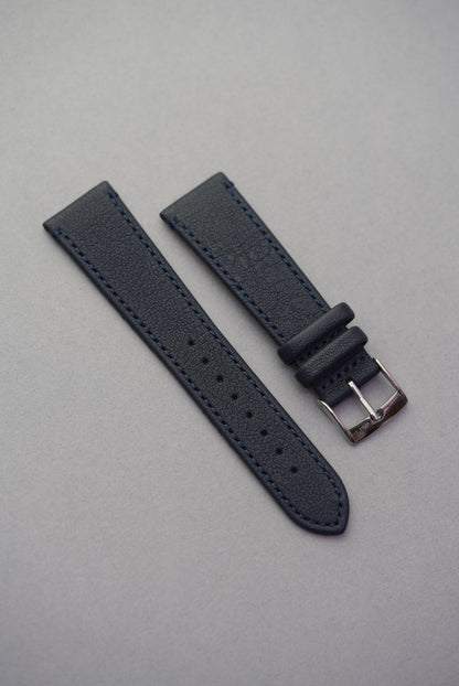 Midnight Capri sheepskin watch strap in deep navy blue with matching stitching and polished buckle.