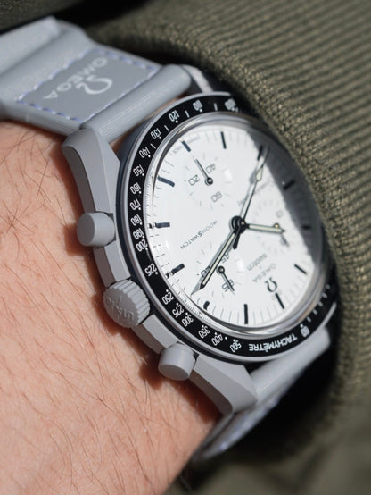 MoonSwatch 1965 — side profile showing black Bioceramic case and crown