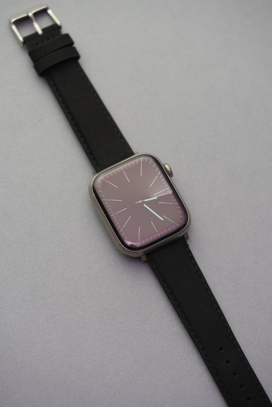 Black nubuck strap fitted to an Apple Watch, shown in full for a clean and modern look.