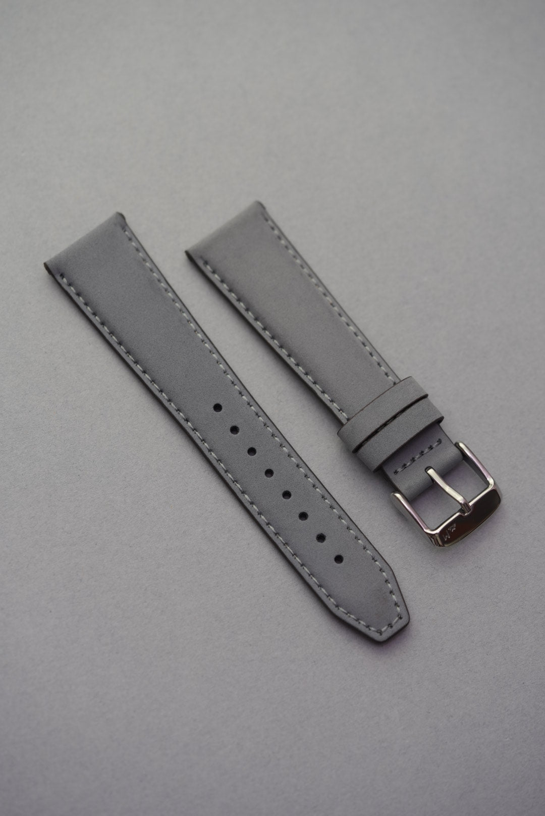 Grey nubuck leather watch strap with silver buckle, available in 18mm to 24mm.