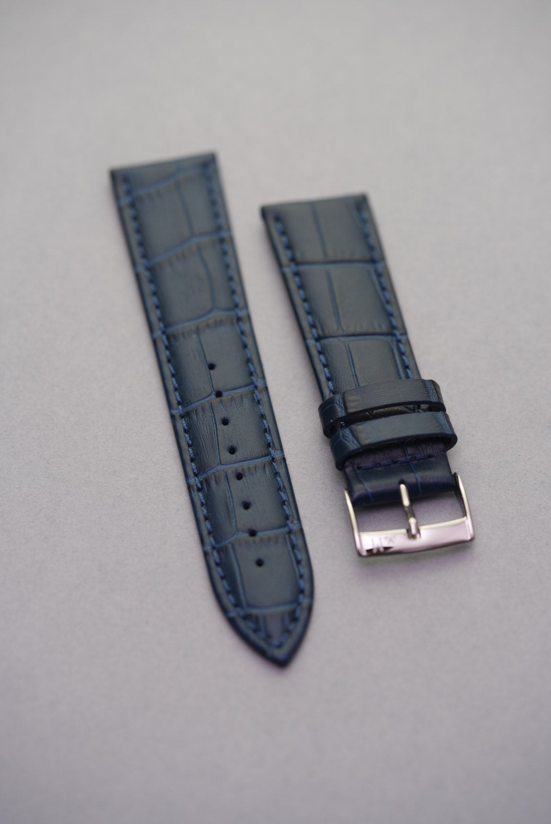 Full set view of navy blue Oxford leather strap – versatile calfskin strap for dress and everyday watches.