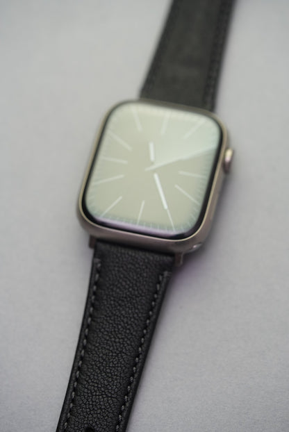 Detailed view of Piano Noir strap adapters for Apple Watch, crafted in stainless steel for a seamless fit.