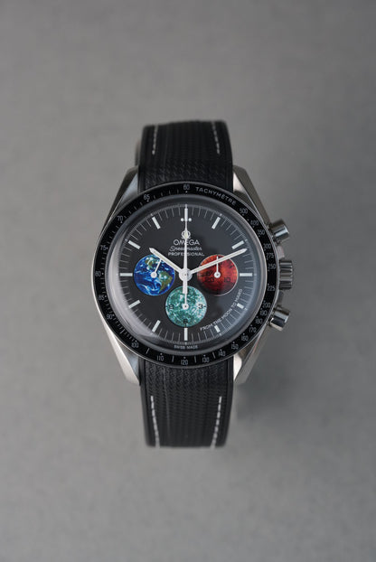 Omega watch with a detailed face on a gray background