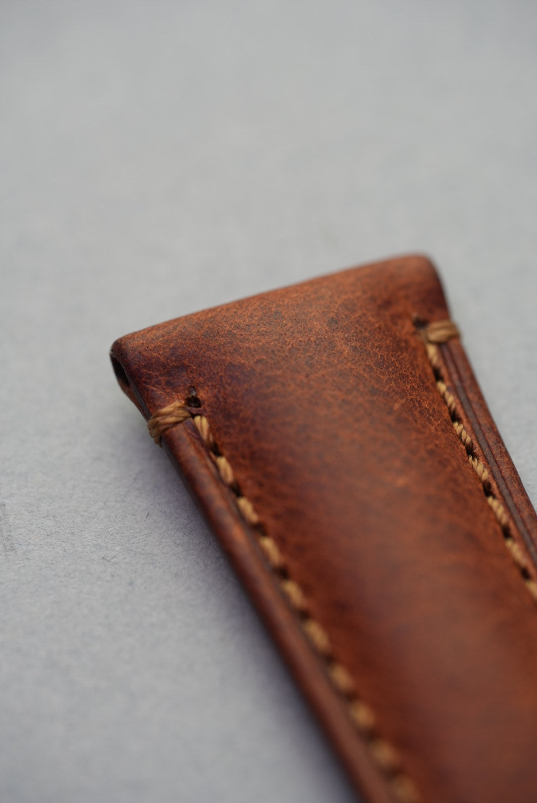 Angled side view of Morellato tan leather watch strap