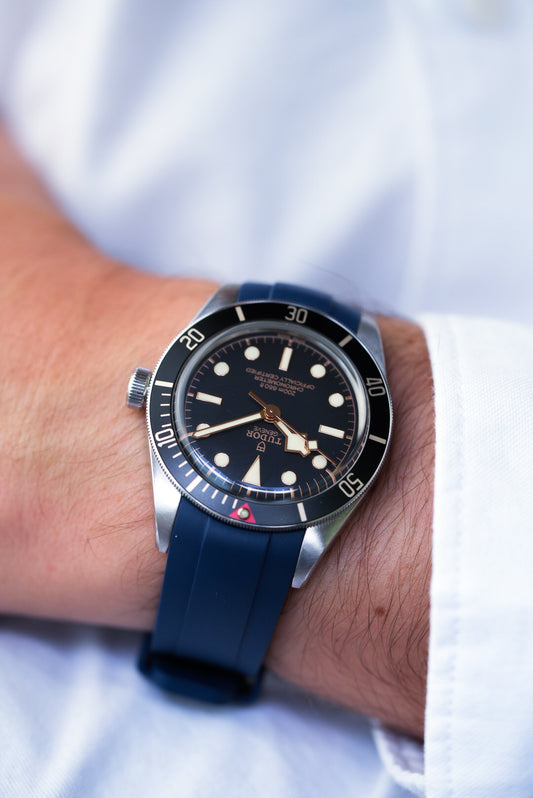 Tudor Black Bay watch with navy FKM rubber strap – sleek, waterproof strap upgrade for a classic dive watch look.