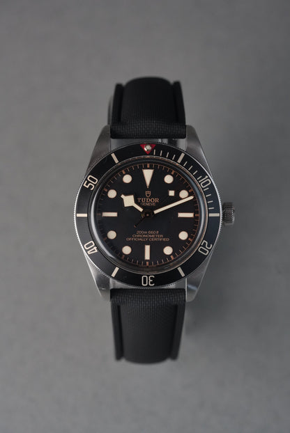Black sailcloth FKM rubber strap with deployant clasp fitted to Tudor Black Bay 58