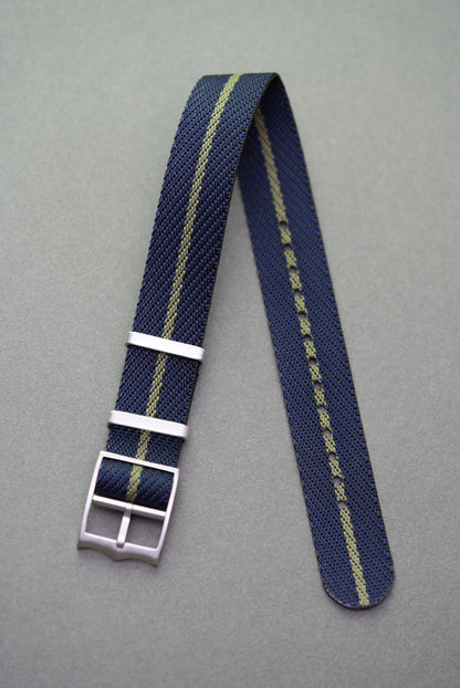 Navy single-pass nylon strap featuring a muted olive stripe, compatible with Tudor watches.